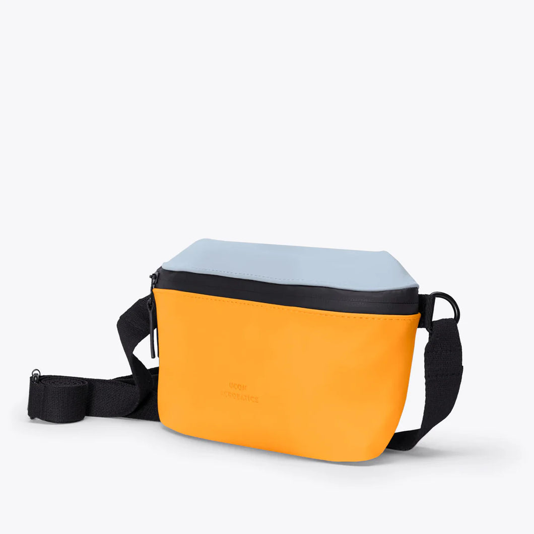 Riñonera minimalista CELESTE